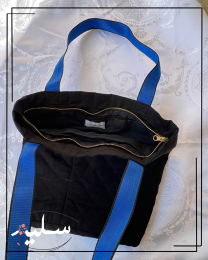 Modern hoopoe bag with royal blue strap -   حقيبة الهدهد العصرية